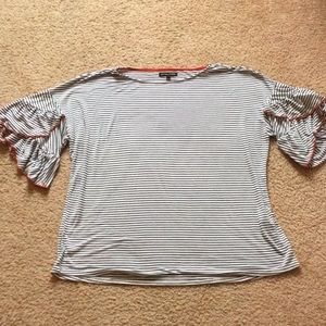 Black & white striped tee with orange detailing